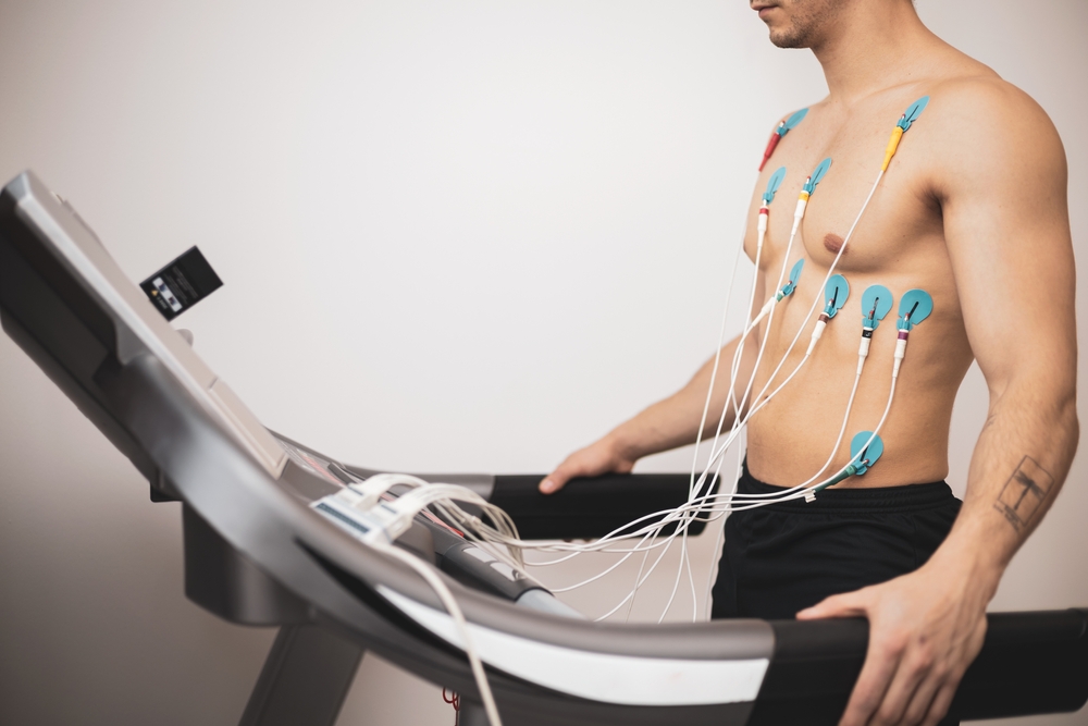 performing treadmill stress test
